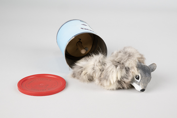 Image of Props from Almost Live! Fake dog food cans and squirrel from 